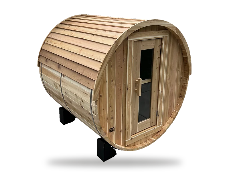Sweat Kingdom Sweat Barrel cedar barrel sauna on black cradles, shown with the optional cedar bevel roof